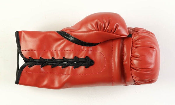 Riddick Bowe Signed Boxing Glove sold