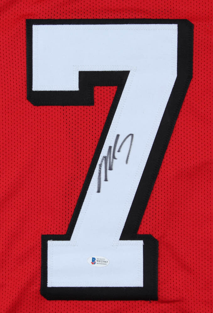 Michael Vick Signed Atlanta Falcons Red Jersey (Beckett COA) 4×Pro Bowl Q.B.