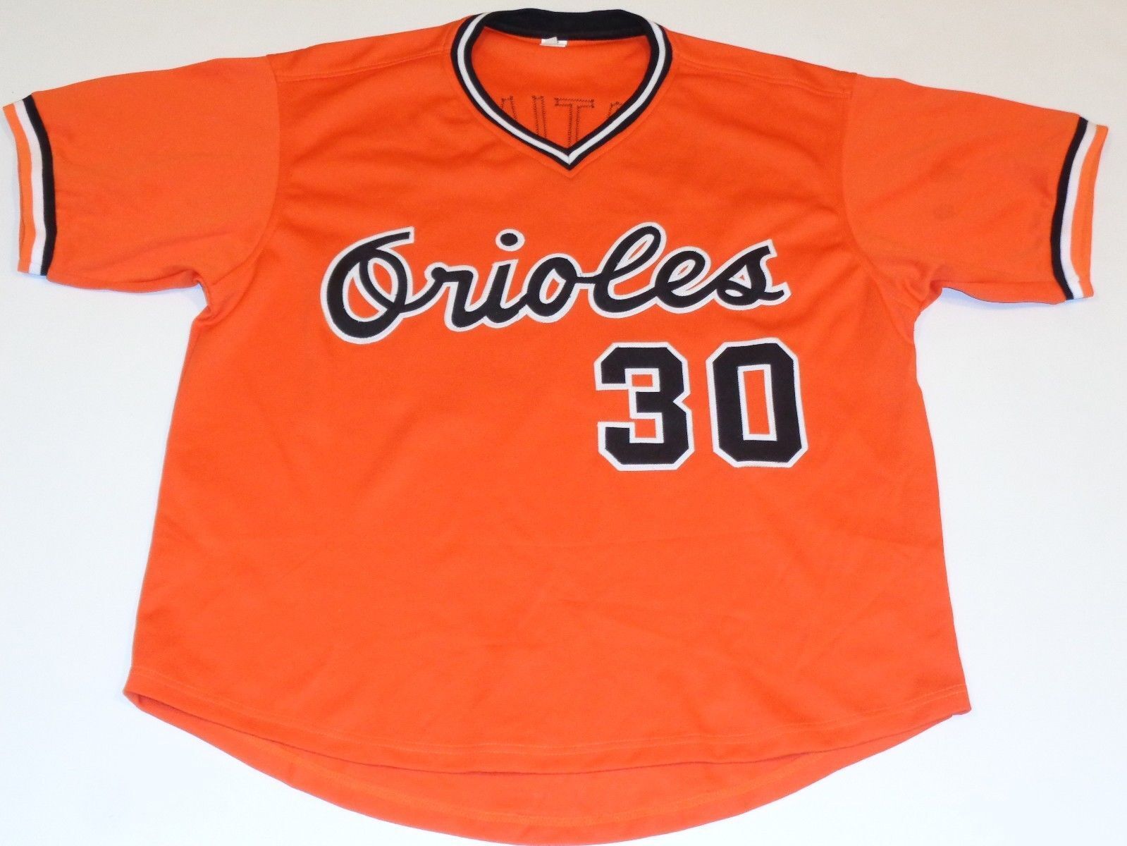 Dennis Martínez Signed Orioles Orange Throwback Jersey (JSA COA) 83 WS Champs