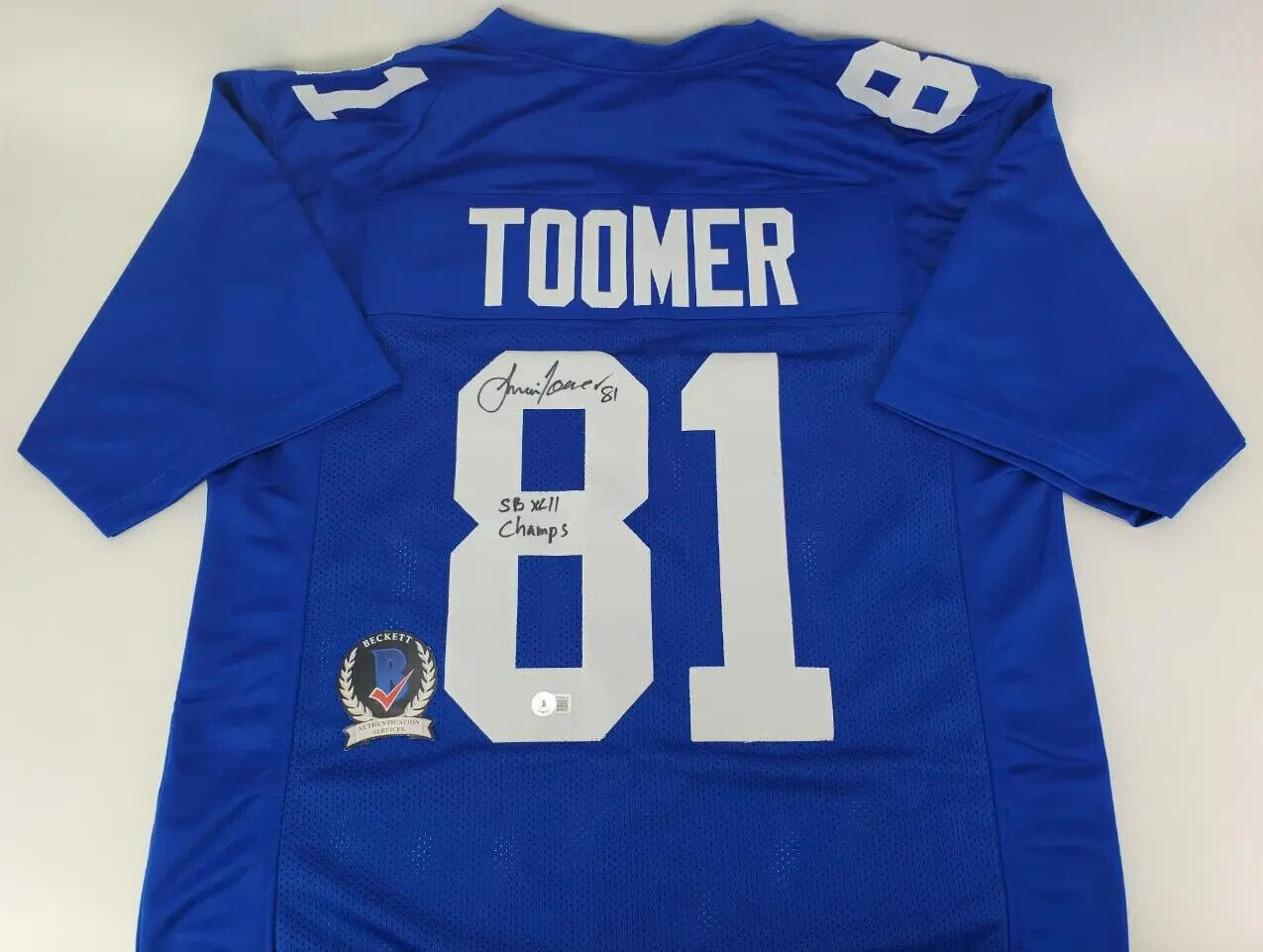 Amani Toomer Signed New York Giants Jersey Inscribed "S.B. XLII Champ" (Beckett)
