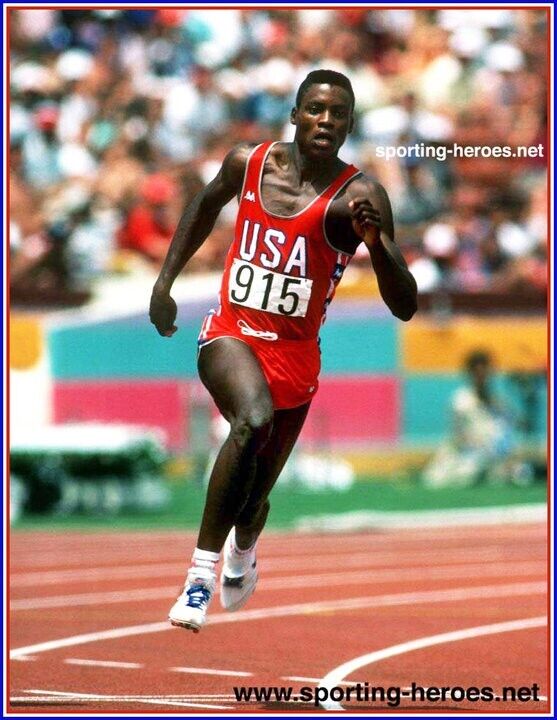 Carl Lewis Signed Team USA Olympic Jersey (JSA) 9xOlympic Gold Medalist