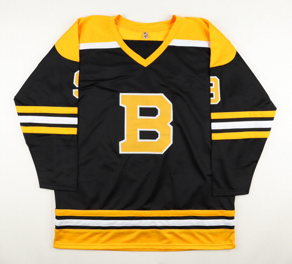 Johnny Bucyk Signed Bruins Captain Jersey Inscribed "H.O.F. 1981" (JSA COA)