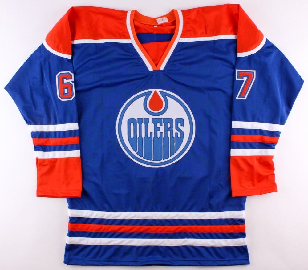 Benoit Pouliot Signed Oilers Jersey (Beckett COA) Playing career 2006–Now