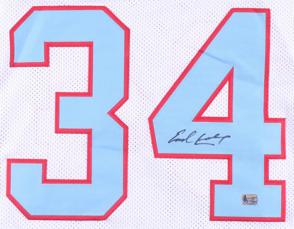 Earl Campbell // Signed Houston Oilers White Jersey Running Action