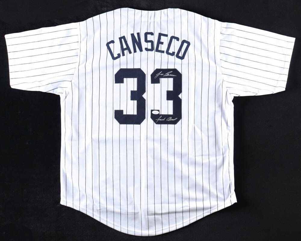 Jose Canseco Signed Oakland A's White Jersey Batting