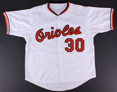 Dennis Martínez Signed Orioles Jersey Inscribed "83 WS Champ" (JSA COA)