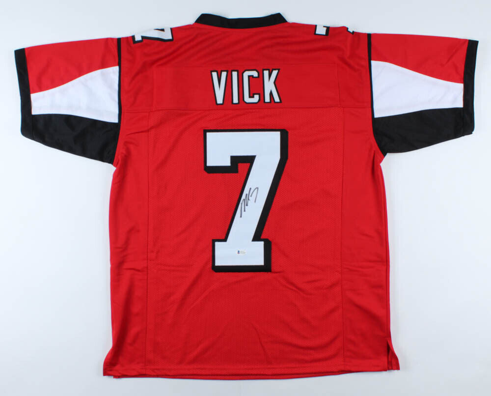 Michael Vick Signed  Atlanta Falcons Red Jersey (Beckett COA) 4×Pro Bowl Q.B.